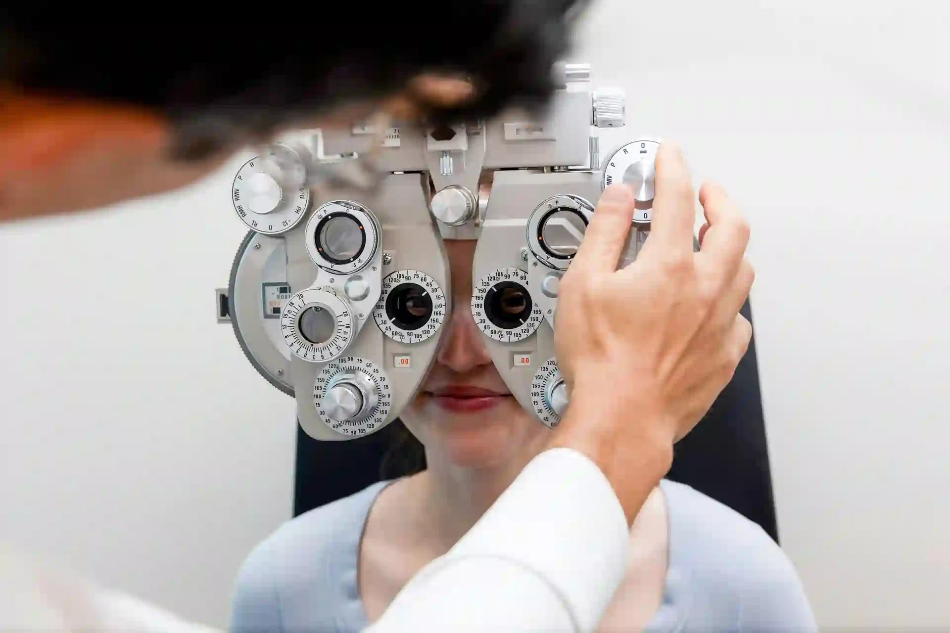 Patient eyes being checked with a machine