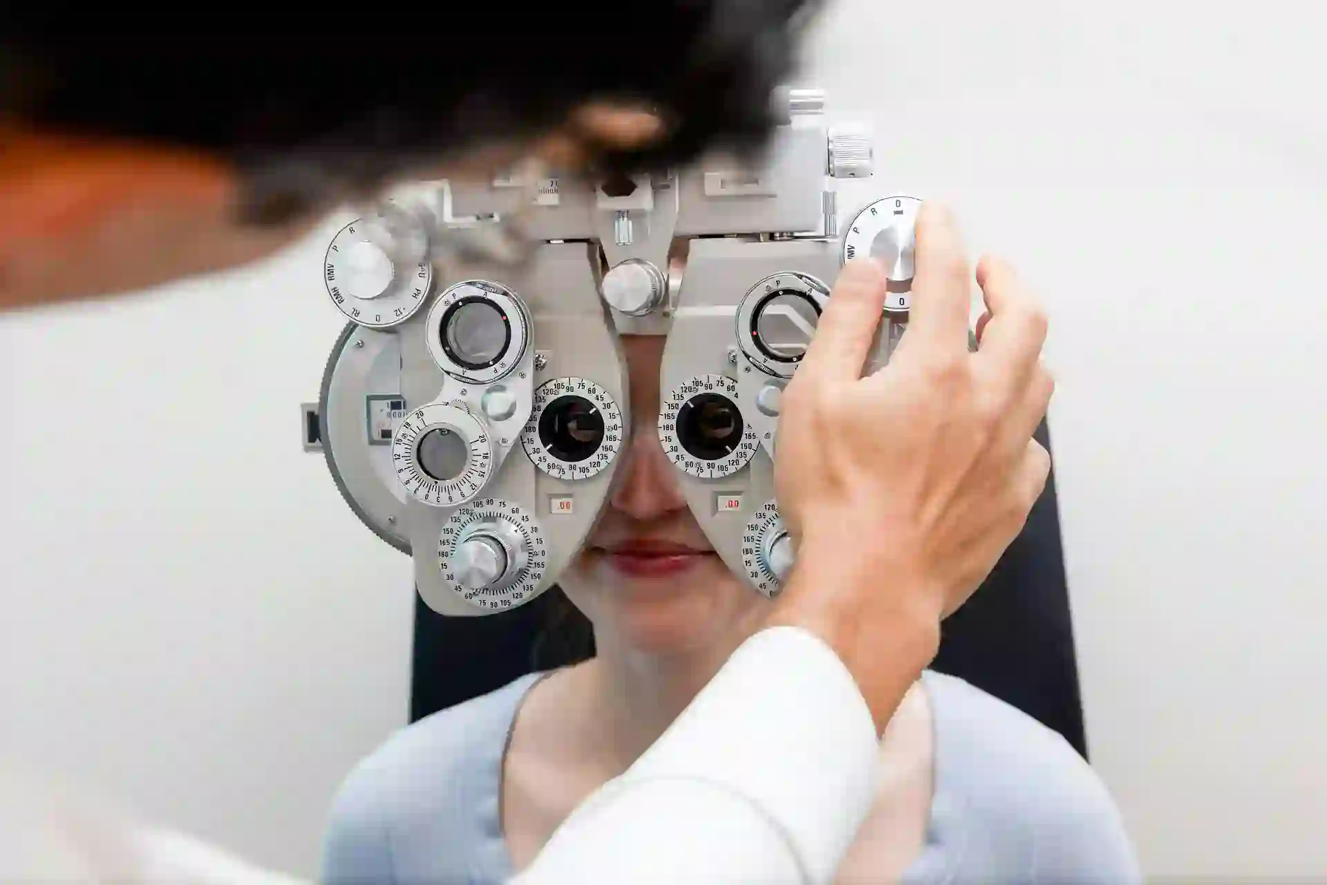 Patient eyes being checked with a machine